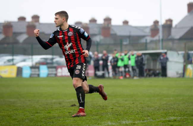 Eoghan Stokes celebrates scoring the winning penalty