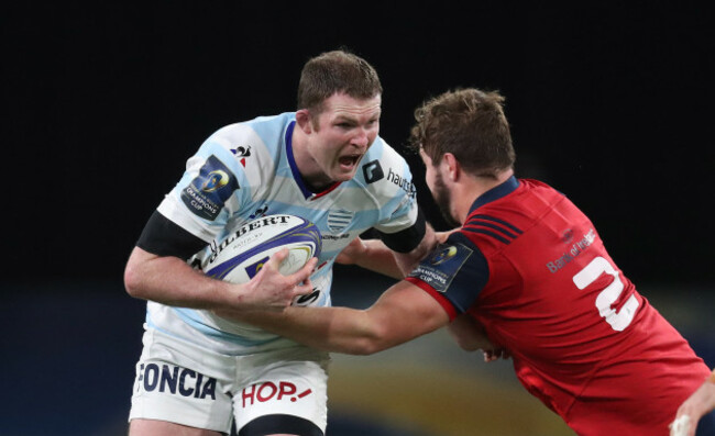 Donnacha Ryan is tackled by Rhys Marshall