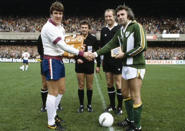 BT Sport. Football. pic: circa 1978. International Match in Dublin. Republic of Ireland v England. England captain Emlyn Hughes meets the Republic of Ireland captain Paddy Mulligan.