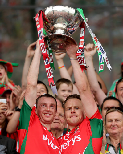 Keith Higgins and Andy Moran lifts the trophy