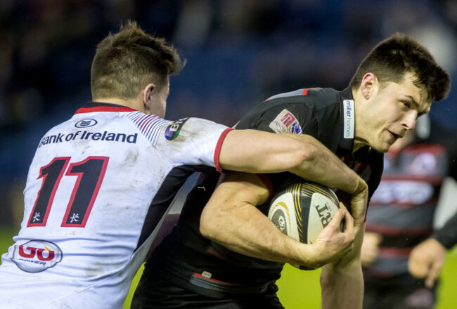 Jacob Stockdale tackles Blair Kinghorn