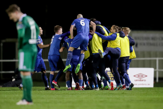 Waterford players celebrate after Izzy Akinade's goal