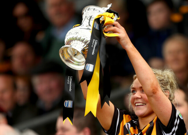 Shelly Farrell lifts the trophy