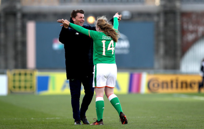 Amber Barrett celebrates with Colin Bell at the final whistle