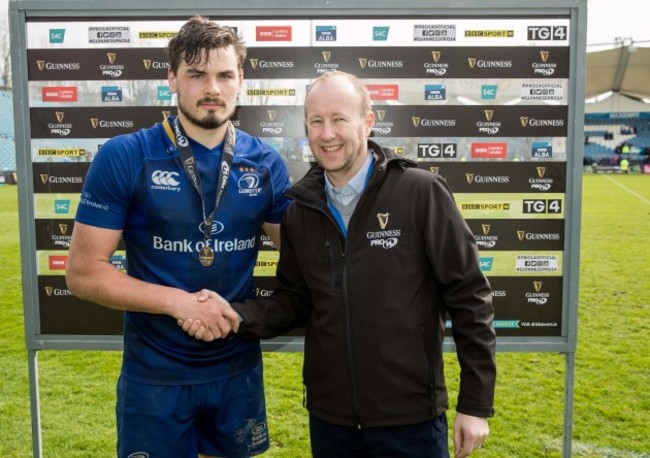 Max Deegan receives the Guinness Man of the Match medal from Rory Sheridan