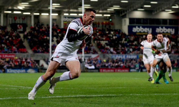 Tommy Bowe crosses the line to score his sides opening try