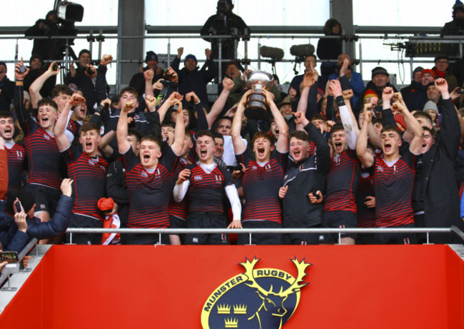 Ben Healy raises the trophy at the end of the game