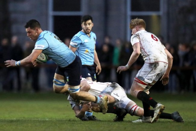 Stephen McVeigh is tackled by Jack Burke