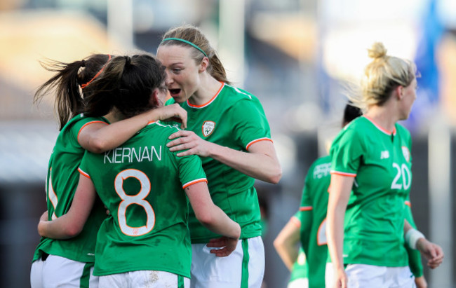 Leanne Kiernan celebrates scoring her sides first goal with Katie McCabe