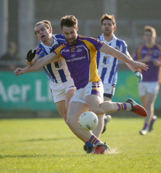 Shane Horan scores a goal despite Cian Murray