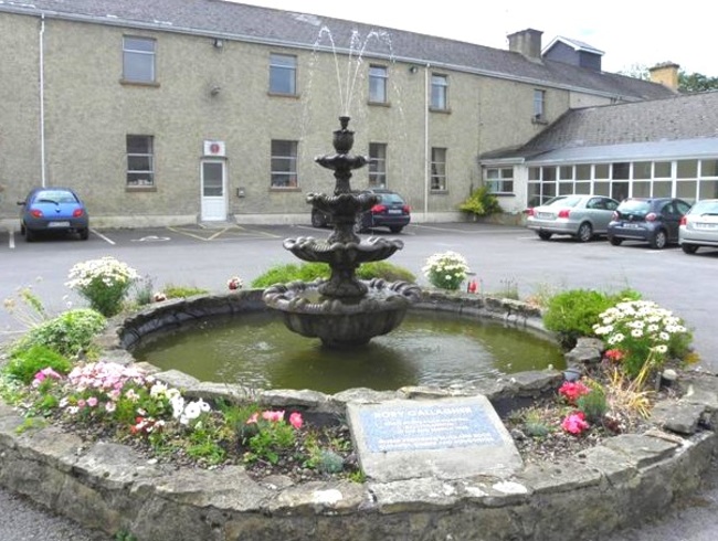 The fountain at Ballyshannon's Rock Hospital, featuring Gallagher's birthplace plaque.