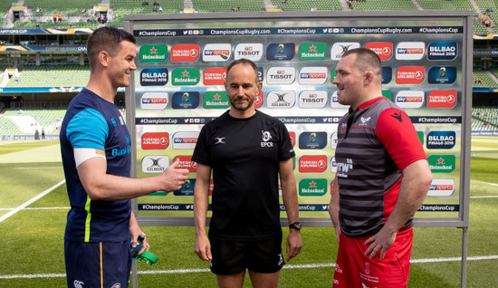 Ken Owens and Jonathan Sexton with referee Romain Poite during the coin toss