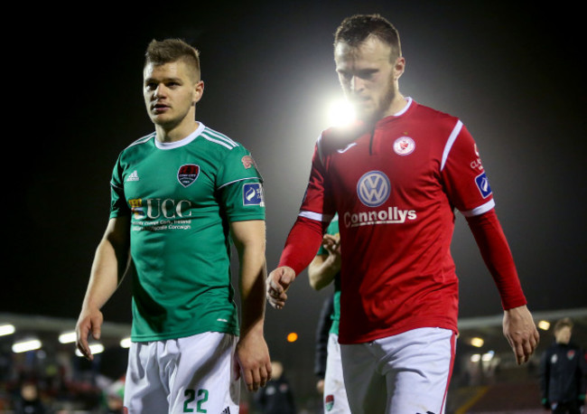 Sean McLouglin and David Cawley leave the pitch after the game