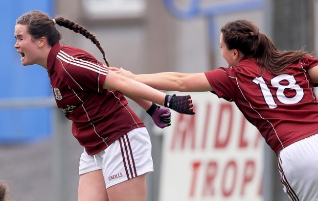 Nicola Ward celebrates scoring her side's second goal with Gillian O'Connor