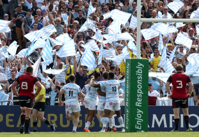 Maxime Machenaud celebrates scoring his sides third try with teammates