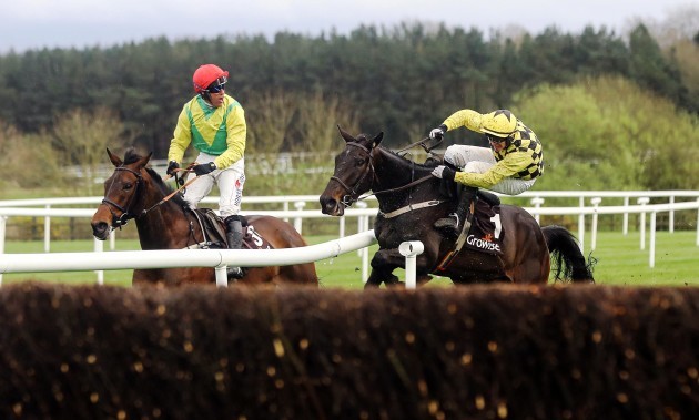 Paul Townsend onboard Al Boum Photo forces Robbie Power onboard Finian's Oscar off the track as they approach the last jump
