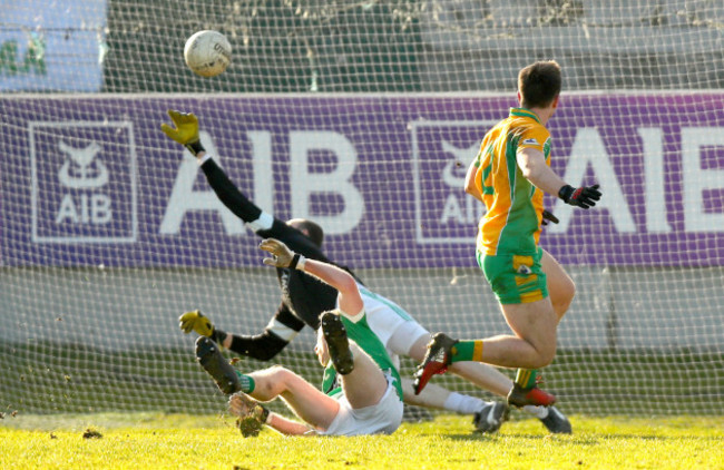 Liam Silke scores the winning goal despite Liam Callaghan and goaljeeper Tom Kinsella