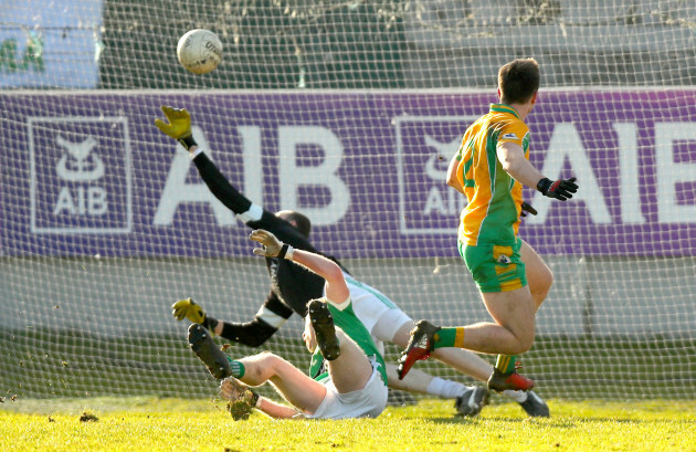 Liam Silke scores the winning goal despite Liam Callaghan and goaljeeper Tom Kinsella