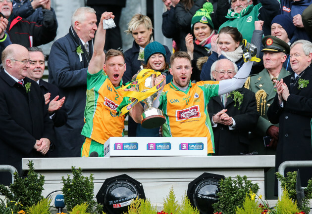 Ciaran McGrath and Micheal Lundy lift the cup