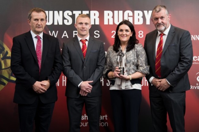 Keith Earls, Garrett Fitzgerald and Niall O'Donovan present Olive Foley on behalf of Anthony Foley with the Hall Of Fame Award