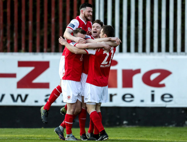 Jake Keegan celebrates scoring the first goal of the game with teammates