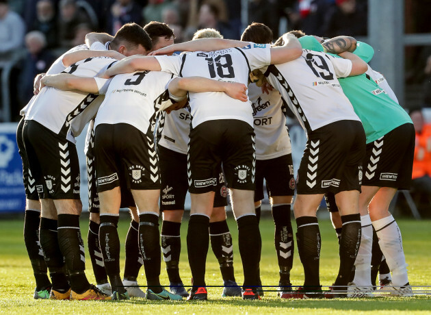 The Bohemians team huddle ahead of the game