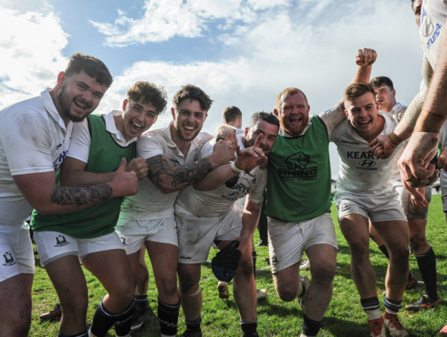 Cork Constitution players celebrate after the game