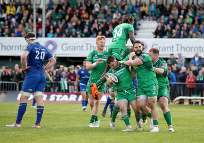 Caolin Blade celebrates his try with Niyi Adeolokun and Peter McCabe