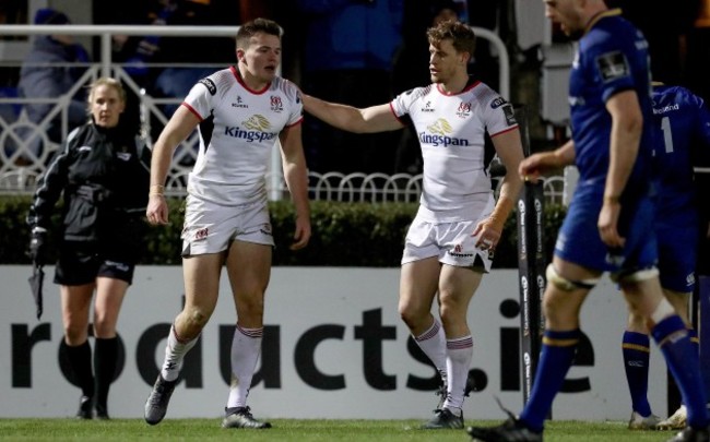 Jacob Stockdale celebrates scoring a try with Andrew Trimble