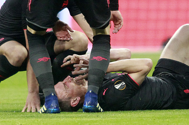 Koscielny expected to miss the World Cup after being stretchered off in ...