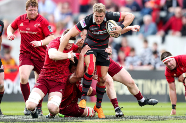 Duhan van der Merwe tackled by Jack O'Donoghue, Rory Scannell and Jean Kleyn