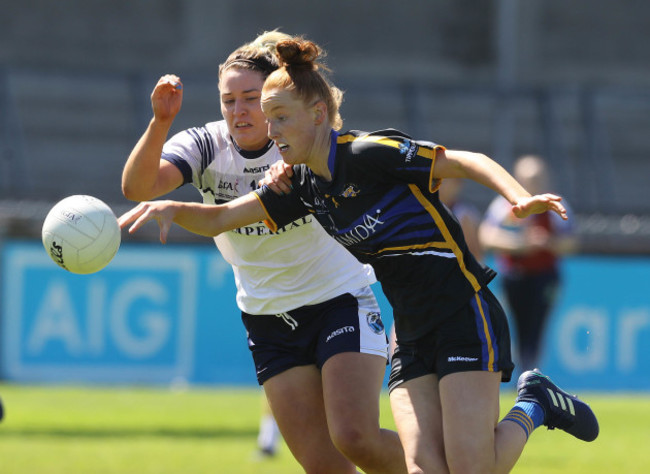 Grainne McGlade tackles Aisling Moloney