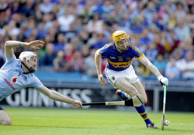 Lar Corbett scores a goal despite the attention of Pater Kelly