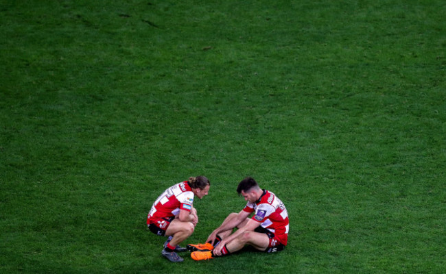 Callum Braley and Mark Atkinson dejected after the game