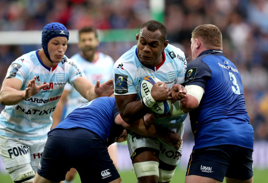 Leone Nakarawa is tackled by Jordi Murphy and Tadhg Furlong