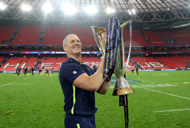 Stuart Lancaster celebrates with the European Rugby Champions Cup trophy