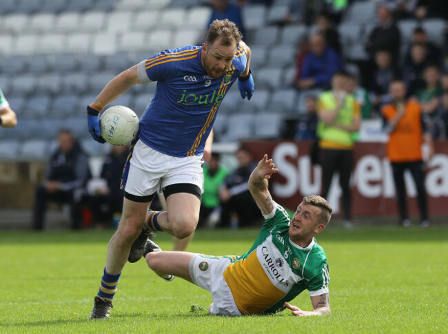 Craig Dunne tackles James Stafford