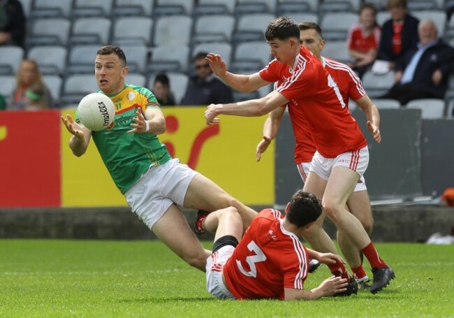 Darragh Foley gets the ball away under pressure