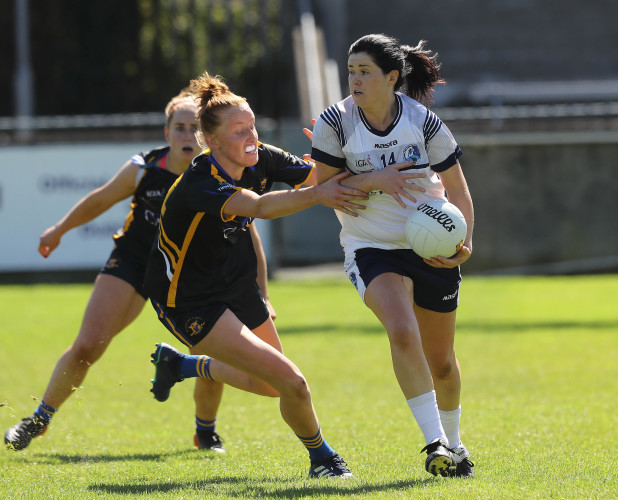 Aisling Maguire tackled by Aishling Moloney