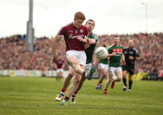 Keith Higgins tackles Cathal Duggan