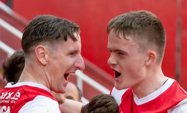 Ian Bermingham and Thomas Byrne celebrate Dean Clarke's goal