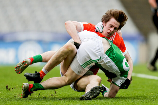 Andrew Murnin and Daniel Teague scuffle during the game
