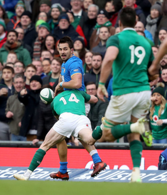 Keith Earls makes a try saving tackle on Mattia Bellini