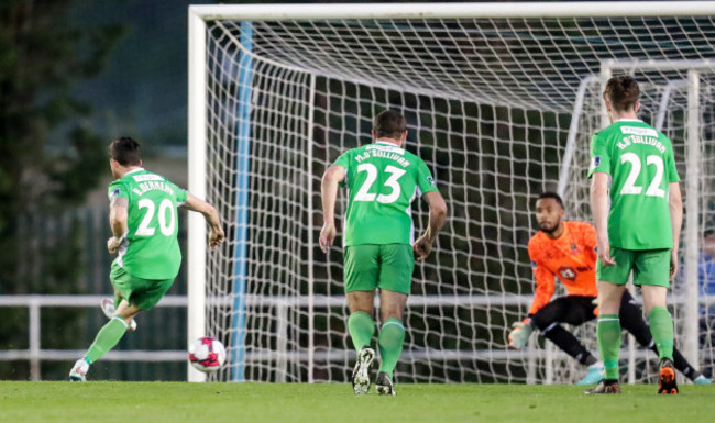 Billy Dennehy scores their sixth goal from the penalty spot