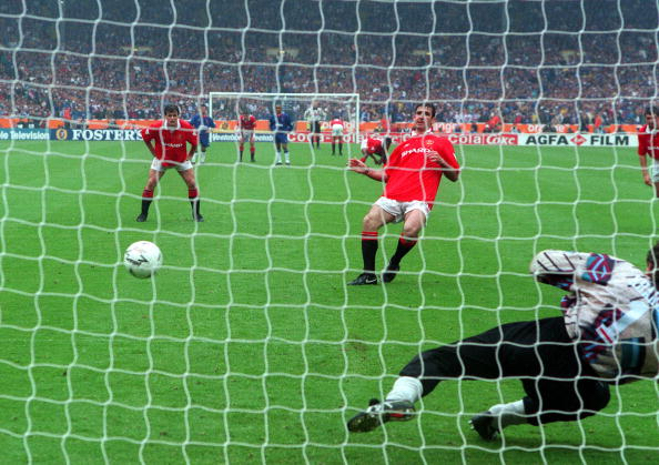 Football. 1994 FA Cup Final. Wembley. 14th May, 1994. Manchester United 4 v Chelsea 0. Manchester United's Eric Cantona scores his side's first penalty as Chelsea goalkeeper Dmitri Kharine dives the wrong way.
