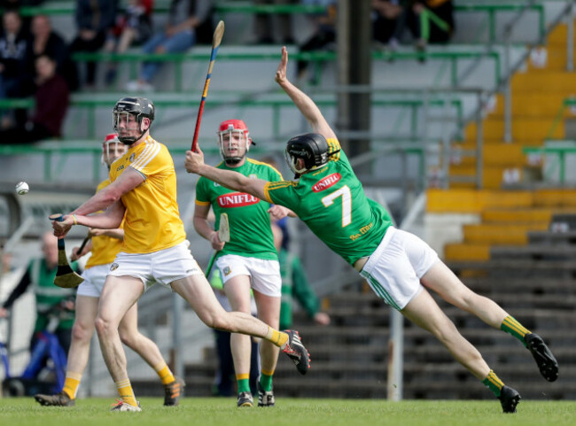 Joe Maskey scores a point despite Shane Brennan