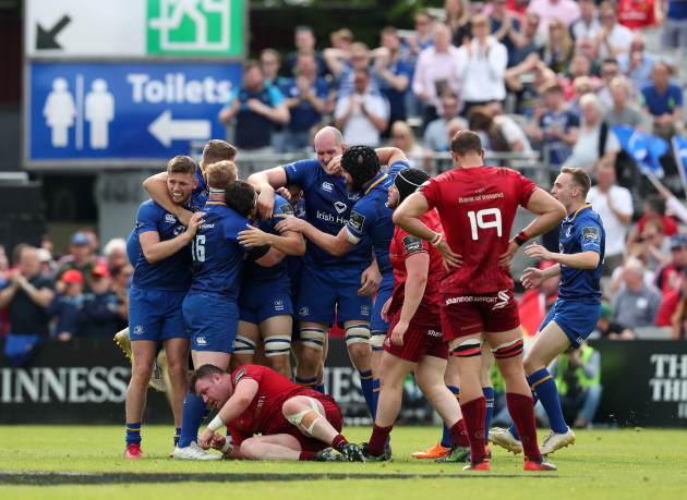 Leinster players celebrate at the final whistle
