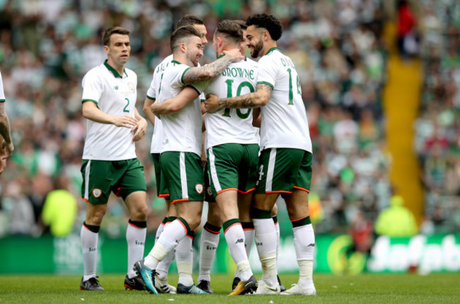 Alan Browne celebrates scoring with his teammates