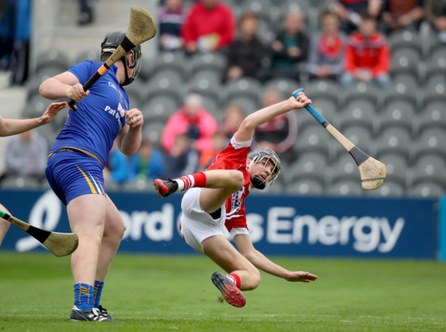 Daniel Hogan is tackled by Cillian O'Brien