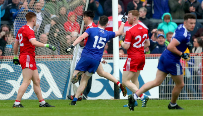 Conor McManus celebrates scoring a late point